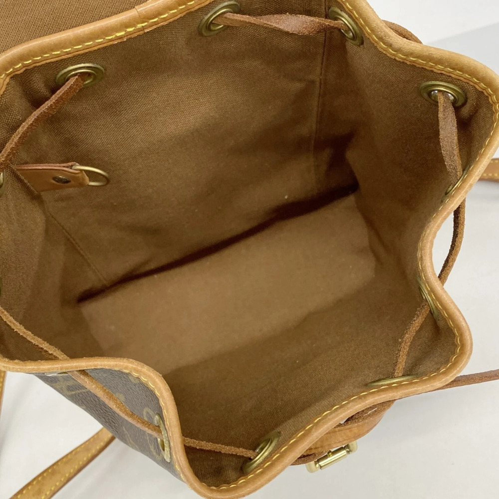 LOUIS VUITTON Brown Monogram Backpack - Picture 4 of 11